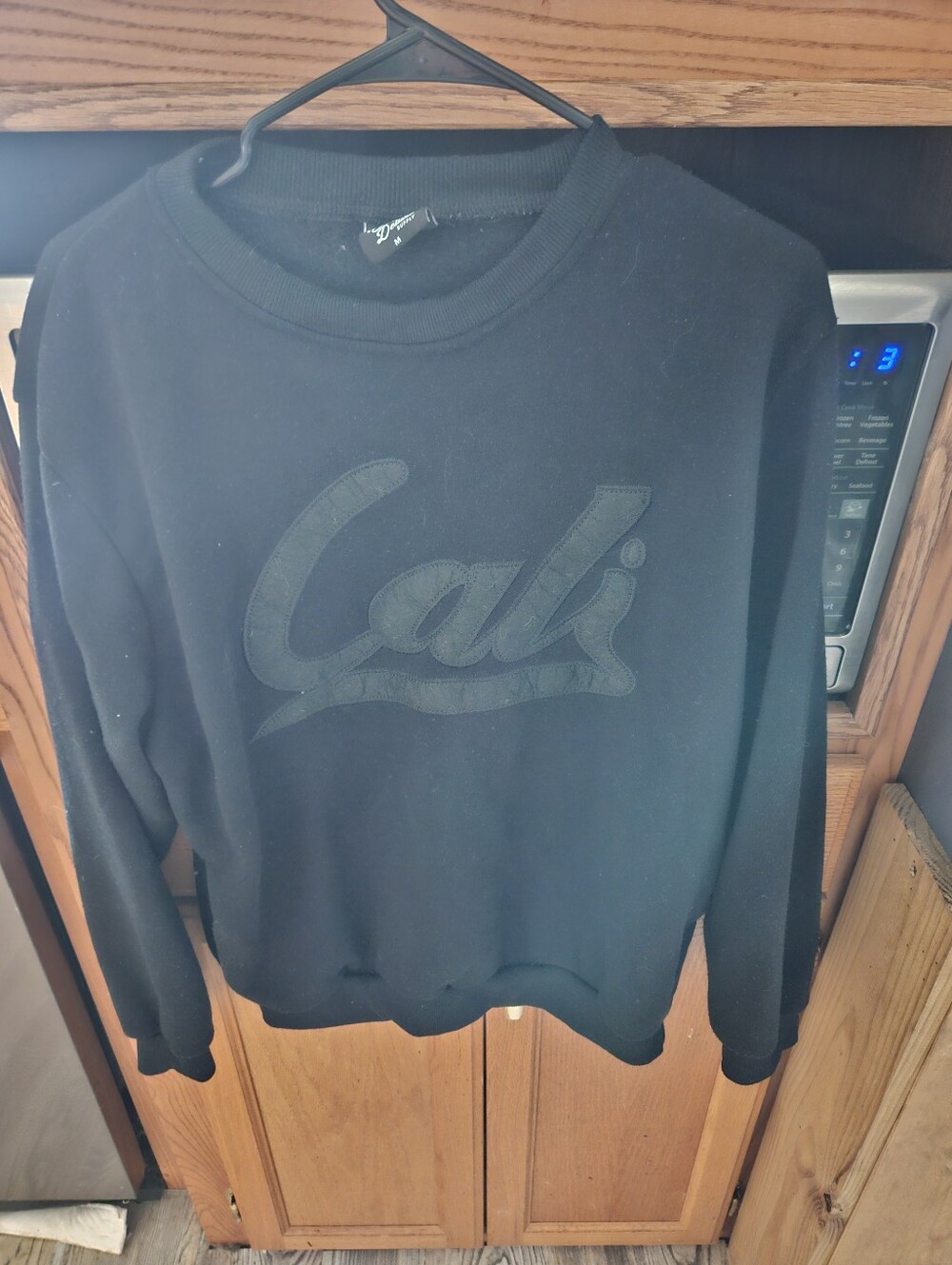 Cali Women's Black Crewneck Sweatshirt - Subtle Logo